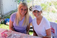 Montgomery Central High School students Kylie Eastin (left) and Bailey McMaham (right) were working the cupcake decorating booth.