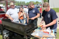 Palmyra Volunteer Fire Department cooking hamburgers and hotdogs.