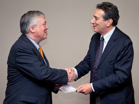 Florim USA's Giovanni Grossi (right) presents a financial gift to APSU President Tim Hall. The gift will be used for scholarships. (Photo by Beth Liggett, APSU Public Relations and Marketing)