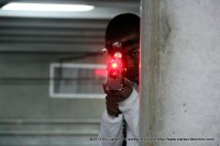 A young man snipes at his enemies during a Laser Tag Game