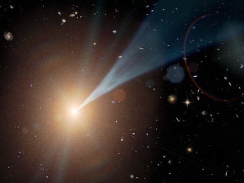 This artist's concept shows a "feeding," or active, supermassive black hole with a jet streaming outward at nearly the speed of light. Such active black holes are often found at the hearts of elliptical galaxies. Not all black holes have jets, but when they do, the jets can be pointed in any direction. If a jet happens to shine at Earth, the object is called a blazar. (Image credit: NASA/JPL-Caltech)