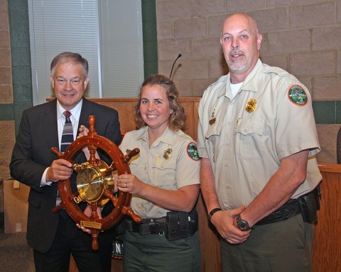 Boating Officer of the Year Pam McDonald with TWRA Executive Director Ed Carter (left) and Boating and Law Enforcement Division Chief Darren Rider. The award was presented during Friday's (April 13) meeting of the Tennessee Wildlife Resources Commission.