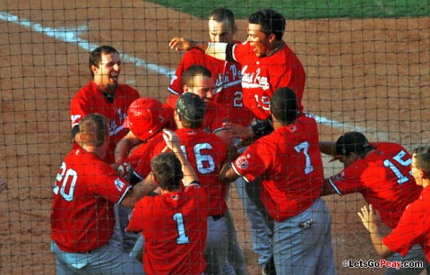 Austin Peay surrounds third baseman Greg Bachman after he scores on a wild pitch to win a 7-6 contest against Jacksonville State, Friday afternoon. Austin Peay Baseball. (Courtesy: Austin Peay Sports Information)