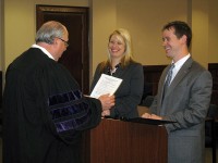 Elizabeth Fendley Hahn and Jacob W. Fendley prepare to be sworn in as attorneys by the Honorable Judge Ray Grimes.