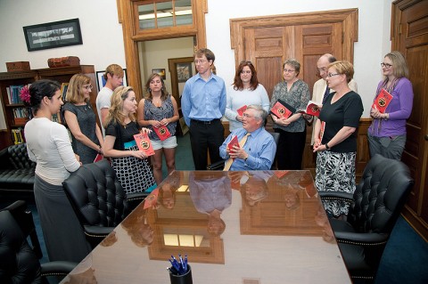 APSU President Tim Hall congratulates members of the Theta-Delta History Journal’s Board of Editors on the publication of the second volume of that scholarly publication. (Photo by Beth Liggett/APSU staff).