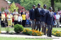 The colors were posted by the Elester Garner Chapter of the 555th Triple Nickel as members of the Gold Star Wives look on