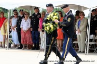 Maj. Gen. James C. McConnell, commander of the 101st Airborne Division (Air Assault), along with Command Sgt. Maj. Scott Schroeder prepare to lay the wreath honoring those of the 101st Airborne Division (Air Assault) has lost through the years, as Montgomery County Mayor Carolyn Bowers looks on from the audience.