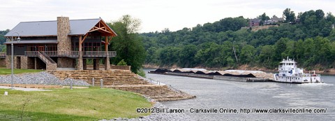 The MV Martha Denton heading up river past the entrance to the Clarksville Marina in Clarksville Tennessee.