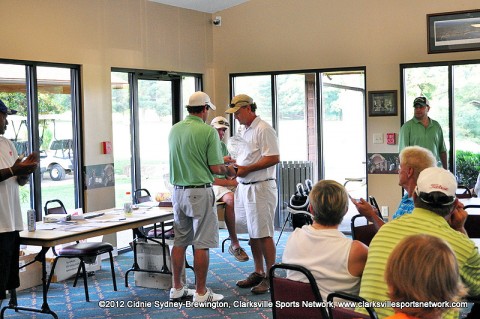 Greg Guinn receives his trophy after winning the 2012 Wendy's Invitational Senior Division title.