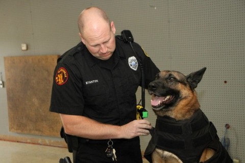 Clarksville Police Service dog getting K-9 body armor put on. (Photo by CPD-Jim Knoll)