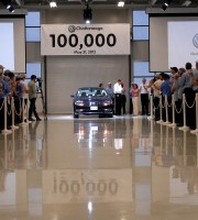 Joanne Benante accepting keys to the 100,000th Passat from Volkswagen Chattanooga CEO and Chairman Frank Fischer