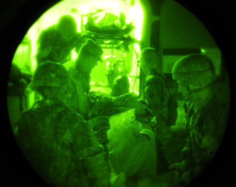 Soldiers from Company C, 801st Brigade Support Battalion, 4th Brigade Combat Team, 101st Airborne Division, load a simulated patient into a frontline ambulance to be transferred to a higher level of care during a mass casualty training exercise, June 20th, 2012, at Fort Campbell, KY. (Photo by Staff Sgt. Todd Christopherson)