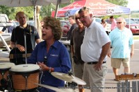 Clarksville Mayor Kim McMillan addressed the crowd as Bill Roberts (white shirt)  looks on