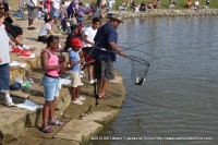The first fish of the day is caught by Javon Santiago just 15 seconds after the first fishing line was cast The first fish of the day is caught by Javon Santiago just 15 seconds after the first fishing line was cast