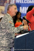 101st Sustainment Brigade Commander Col. Michael Peterman speaks to the returning soldiers. 101st Sustainment Brigade Commander Col. Michael Peterman speaks to the returning soldiers.