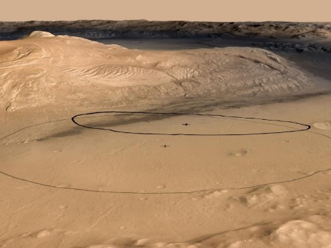 This image shows changes in the target landing area for Curiosity, the rover of NASA's Mars Science Laboratory project. The larger ellipse was the target area prior to early June 2012, when the project revised it to the smaller ellipse centered nearer to the foot of Mount Sharp, inside Gale Crater. (Image Credit: NASA/JPL-Caltech/ESA/DLR/FU Berlin/MSSS)