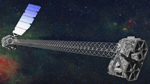 Artist's concept of NuSTAR in orbit. NuSTAR has a 33-foot (10-meter) mast that deploys after launch to separate the optics modules (right) from the detectors in the focal plane (left). (Image credit: NASA/JPL-Caltech)