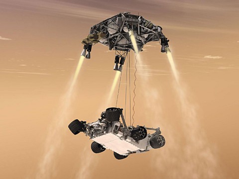 This artist's concept shows the sky crane maneuver during the descent of NASA's Curiosity rover to the Martian surface. (Image credit: NASA/JPL-Caltech)