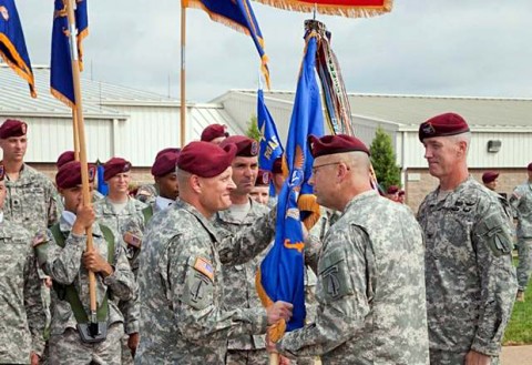 Col. John R. Evans (left) accepts the 160th Special Operations Aviation Regiment Colors from Col. Clayton M. Hutmacher, U.S. Army Special Operations Aviation Command Commanding General, as he assumed command from Col. John W. Thompson during a ceremony at Fort Campbell, KY, on Friday. (U.S. Army Photo)