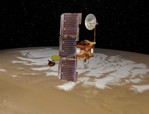 NASA's Mars Odyssey spacecraft passes above Mars' south pole in this artist's concept illustration. The spacecraft has been orbiting Mars since October 24th, 2001. (Image credit: NASA/JPL)