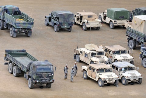 Soldiers from 1st Brigade Combat Team, 101st Airborne Division, conduct preventive maintenance on their vehicles July 1st at the Joint Readiness Training Center here. (Photo by Sgt. Jon Heinrich)