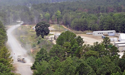 Soldiers from 1st Brigade Combat Team, 101st Airborne Division, drive their convoy into Forward Operating Base Spirit July 1st at the Joint Readiness Training Center here. (Photo by Sgt. Jon Heinrich)