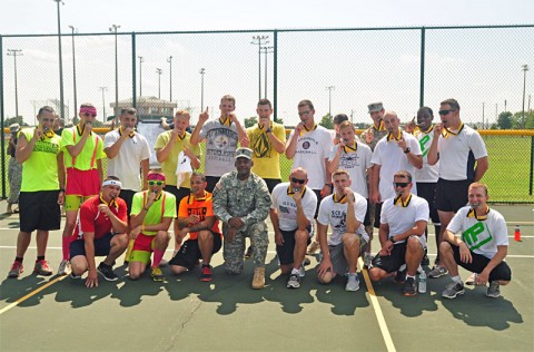 Fort Campbell- Strike’s dodge ball team made of Soldiers from the 2nd Brigade Combat Team, 101st Airborne Division (Air Assault), poses with Command Sgt. Maj. Alonzo J. Smith, command sergeant major of the 101st Airborne Division and Fort Campbell, after winning the Week of the Eagles 2012 Dodge Ball tournament at Fort Campbell, Aug 15. The Dodge ball tournament is a new event for Fort Campbell’s Week of the Eagles, which is held to build cohesion within the brigade teams throughout the division. (U.S. Army photo by SPC. Jared Houke, 2nd BCT PAO, 101st ABN. DIV)