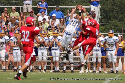 Clarksville Academy's #10 Clay Goad goes up to catch a pass amongst two Montgomery Central defenders Saturday afternoon.