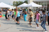 Dancing to the “Cha Cha Slide”.