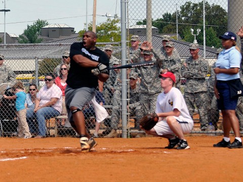 First Sgt. Frederick Jones, first sergeant for Company C, 4th Brigade Special Troops Battalion, 4th Brigade Combat Team, 101st Airborne Division, hits the ball during a game against 2nd BCT, 101st Abn. Div. Aug. 15 at North Sports Complex here. The softball game was the Championship Match for the Week of the Eagles 2012 Softball Tournament and was won by 2nd BCT. (Photo by Sgt. Jon Heinrich)