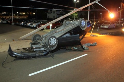 2002 Honda Civic that filpped over on College Street Wednesday morning. (Photo by CPD-Jim Knoll)