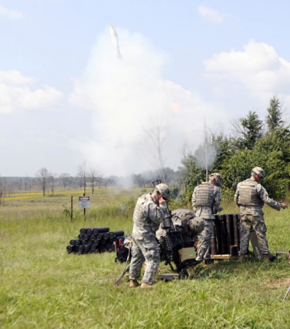 Gun 2, Headquarters and Headquarters Company, 2nd Battalion, 327th Infantry Regiment, 1st Brigade Combat Team, 101st Airborne Division, fires a 120mm white phosphorus mortar round, Sept. 5th, at Observation Point 3 here. (Photo by Sgt. Jon Heinrich)