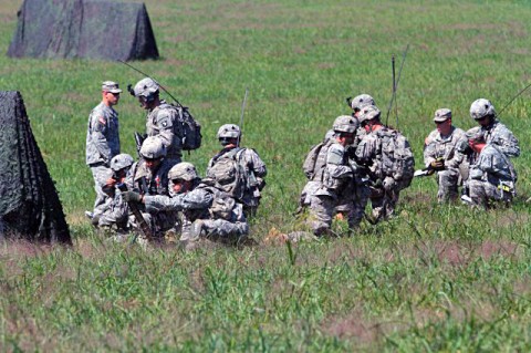 Soldiers from 2nd Battalion, 506th Infantry Regiment and 4th Battalion, 320th Field Artillery Regiment, 4th Brigade Combat Team, 101st Airborne Division, conduct walk-and-shoot rehearsals on Son Drop Zone, Aug. 28, 2012 at Fort Campbell, Ky. The walk-and-shoot rehearsals are designed to provide an additional iteration for company, battery, and troop leadership with an opportunity to exercise and refine their capability to call for fire and request close combat aircraft prior to a live fire exercise. (U.S. Army photo by Staff Sgt. Todd A. Christopherson, 4th Brigade Combat Team Public Affairs)