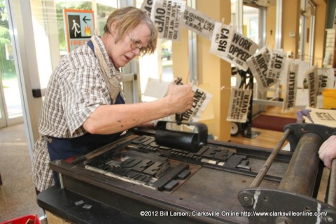 Cynthia Marsh inking the Goldsmith press at the APSU Library on 9/11