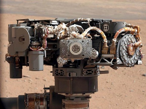 This image shows the Alpha Particle X-Ray Spectrometer (APXS) on NASA's Curiosity rover, with the Martian landscape in the background. (Image credit: NASA/JPL-Caltech/MSSS)