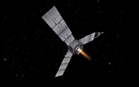 This artist's concept depicts NASA's Juno spacecraft during a burn of its main engine. (Image credit: NASA/JPL-Caltech/Eyes)