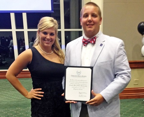 Aubrey Harris, circle vice president, and R.J. Taylor, circle president, receive the ODK Superior Circle Award at the society’s national convention. 