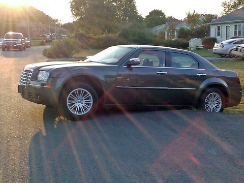 Chrysler 300 that was hit by gunfire stuck in a culver. (Photo by Officer Jesse Scott-CPD)