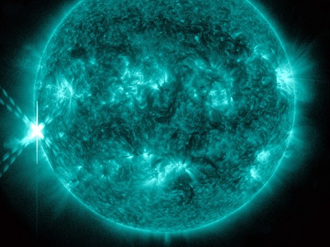 NASA's Solar Dynamics Observatory (SDO) captured this image of an M9-class flare on Oct 20th, 2012 at 2:14pm EDT. This image shows light at a wavelength of 131 Angstroms, which corresponds to material at 10 million Kelvin, and is a good wavelength for observing flares. This wavelength is typically colorized as teal, as shown here. (Credit: NASA/SDO)