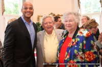 Wes Moore poses for a picture with Mac  and Linda Eddington at the reception in his honor at Archwood