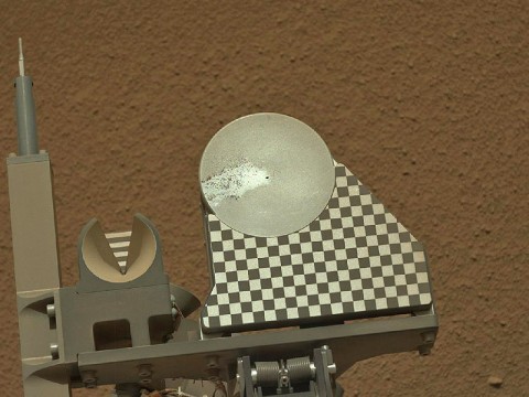 The robotic arm on NASA's Mars rover Curiosity delivered a sample of Martian soil to the rover's observation tray for the first time during the mission's 70th Martian day, or sol (October 16th, 2012). (Image credit: NASA/JPL-Caltech/MSSS) The robotic arm on NASA's Mars rover Curiosity delivered a sample of Martian soil to the rover's observation tray for the first time during the mission's 70th Martian day, or sol (October 16th, 2012). (Image credit: NASA/JPL-Caltech/MSSS)