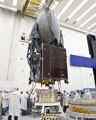 TDRS-K in the Boeing satellite factory undergoing a fit check. (Credit: Boeing)