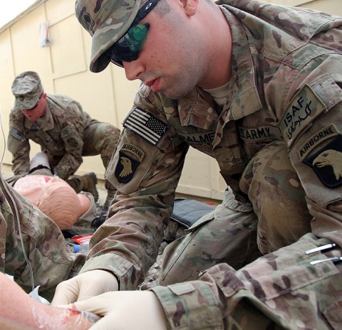 Spc. Stephen Palmer, a West Greenwich, R.I., native and senior medic with Bravo Troop, 1st Squadron, 33rd Cavalry Regiment, 3rd Brigade Combat Team, 101st Airborne Division (Air Assault), administers aid to a fellow soldier while conducting a medical training exercise at Camp Clark, Afghanistan, Oct. 13th, 2012. Palmer’s lifelong passion for providing care is his main motivation behind his service to country. (Photo by Sgt. 1st Class Abram Pinnington)