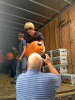 Pumpkins being unloaded.