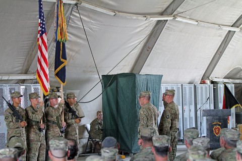 Col. R.J. Lillibridge, commander of the 3rd Brigade Combat Team “Rakkasans”, 101st Airborne Division (Air Assault), Task Force 3-101, and Command Sgt. Maj. Eric Crabtree, Command Sgt. Maj. of the 3rd BCT, 101st ABN DIV (ASSLT), salute the American flag after uncasing their Brigade colors during the Transfer of Authority ceremony at Forward Operating Base Salerno, Khost Province, Afghanistan, Oct. 6, 2012. (Photo By: Army Sgt. 1st Class Abram Pinnington)