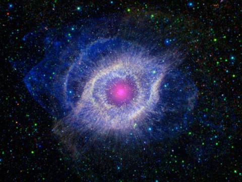 A dying star is throwing a cosmic tantrum in this combined image from NASA's Spitzer Space Telescope and the Galaxy Evolution Explorer (GALEX), which NASA has lent to the California Institute of Technology in Pasadena. In death, the star's dusty outer layers are unraveling into space, glowing from the intense ultraviolet radiation being pumped out by the hot stellar core. (Image credit: NASA/JPL-Caltech) A dying star is throwing a cosmic tantrum in this combined image from NASA's Spitzer Space Telescope and the Galaxy Evolution Explorer (GALEX), which NASA has lent to the California Institute of Technology in Pasadena. In death, the star's dusty outer layers are unraveling into space, glowing from the intense ultraviolet radiation being pumped out by the hot stellar core. (Image credit: NASA/JPL-Caltech)