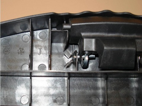 "J" is stamped on the underside of the top step, left of the locking mechanism 