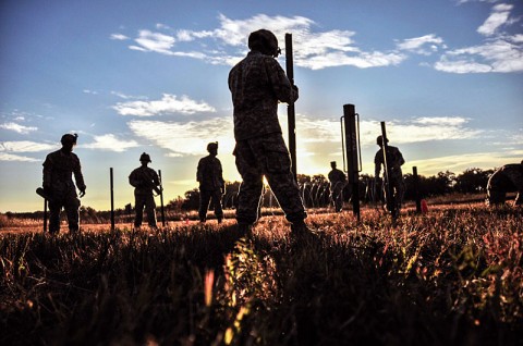 Combat Engineers from Company A, 2nd Brigade Special Troops Battalion, 2nd Brigade Combat Team, 101st Airborne Division (Air Assault), construct an 11-Row Wire Obstacle for both time and efficiency during the Fort Campbell Sapper Stakes 2012 held at the post’s Demolition Range 39 and Training Area 44, Oct. 23rd-24th. (U.S. Army photo by Sgt. Joe Padula, 2nd BCT PAO, 101st Abn. Div.)