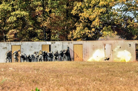 Combat engineers from Company A, 2nd Brigade Special Troops Battalion, 2nd Brigade Combat Team, 101st Airborne Division (Air Assault), breach a locked entrance by detonating a silhouette charge blowing the door apart with an intense explosion, during the division’s Sapper Stakes Competition, Oct. 23rd, held at Fort Campbell’s Demolition Range 39. (U.S. Army photo by Sgt. Joe Padula, 2nd BCT PAO, 101st Abn. Div.) Combat engineers from Company A, 2nd Brigade Special Troops Battalion, 2nd Brigade Combat Team, 101st Airborne Division (Air Assault), breach a locked entrance by detonating a silhouette charge blowing the door apart with an intense explosion, during the division’s Sapper Stakes Competition, Oct. 23rd, held at Fort Campbell’s Demolition Range 39. (U.S. Army photo by Sgt. Joe Padula, 2nd BCT PAO, 101st Abn. Div.)