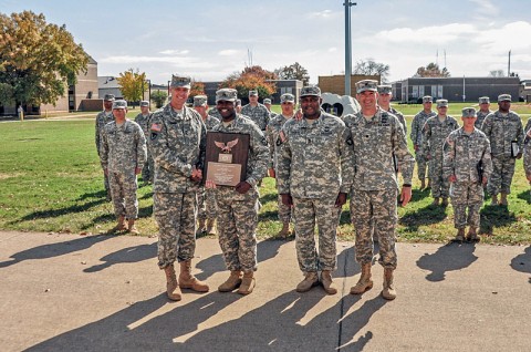 Maj. Gen. John R. “Jack” O’Connor, commanding general of Forces Command logistics, the Strike Brigade’s Staff Sgt. Terrilski Davis, a team leader with Headquarters and Headquarters Company, 526th Brigade Support Battalion, 2nd Brigade Combat Team, 101st Airborne Division (Air Assault), Sgt. 1st Class John Youngblood, the Strike Dining Facility manager and Lt. Col. Townley Hedrick, Strike’s deputy commanding officer, pose for a picture during a presentation ceremony for the Forces Command Level 45th Annual Phillip A. Connelly Award, held outside of the Strike Dining Facility, Oct. 24. (U.S. Army photo by Sgt. Keith Rogers, 2nd BCT PAO UPAR, 101st Abn. Div.)